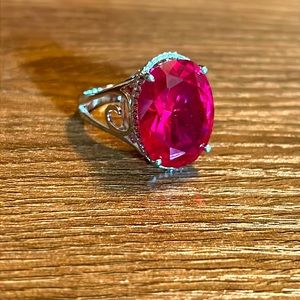 Sterling silver red pink oval gemstone ring with clear gemstones.  Size 9.5